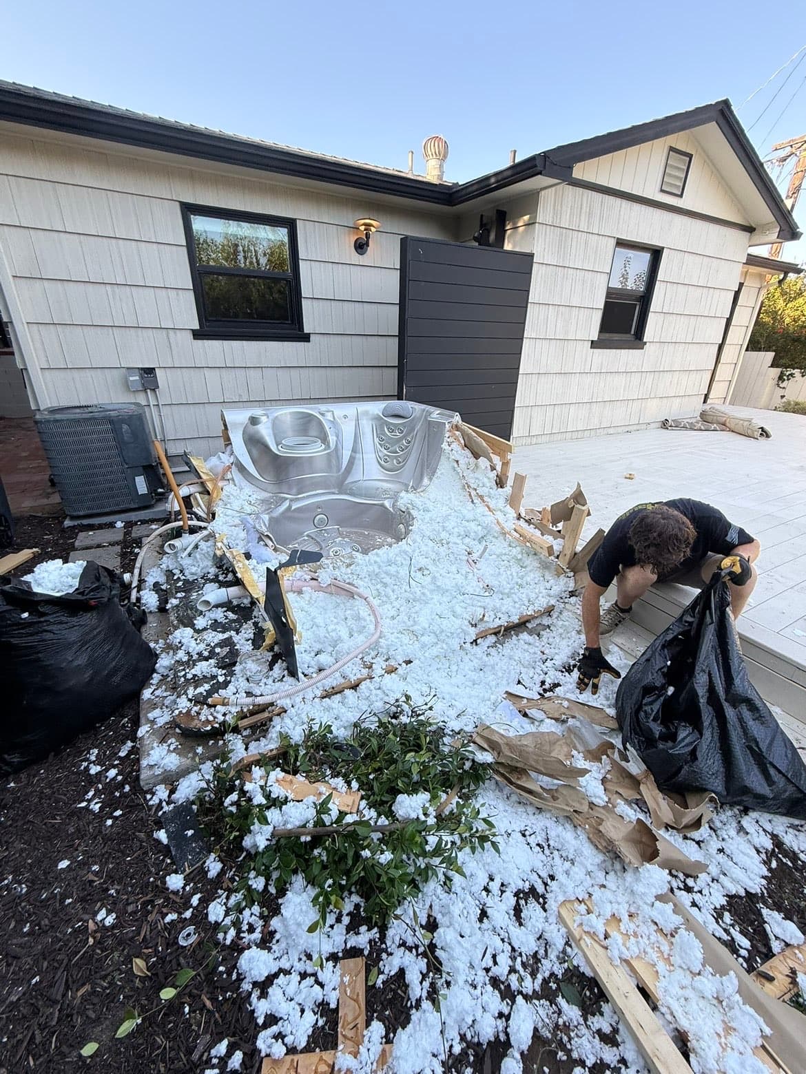 Hot tub removal in Carlsbad, before NexxGen Hauling cleared it